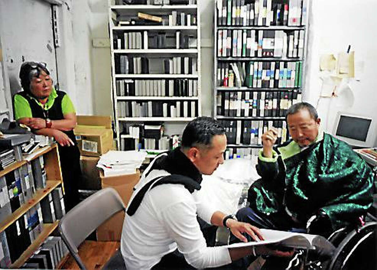 Contributed photos Youngho Kim and Nam June Paik during the taping of Youngho Kim’s video, “Wheelchair Level Eye.”