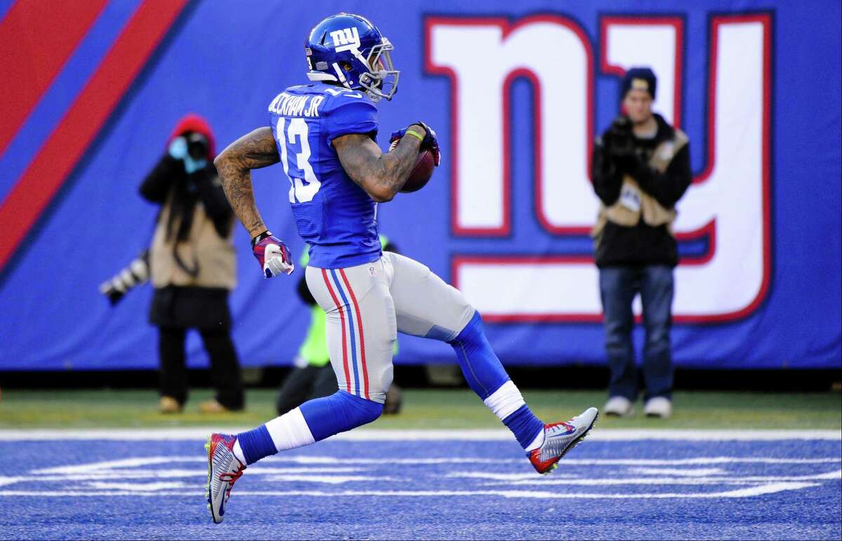 New York Giants wide receiver Odell Beckham (13) scores a touchdown against Washington earlier this season.