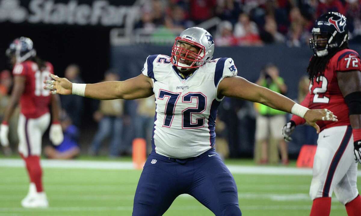 Patriots defensive end Akiem Hicks celebrates after a sack against Texans quarterback Brian Hoyer on Sunday night in Houston.