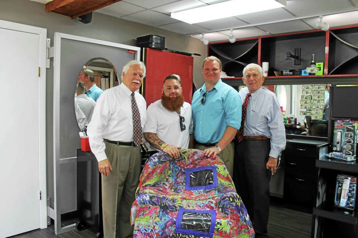 Courtesy photo A grand opening celebration was held Aug. 18 for Get Fresh Barber Shop on Saybrook Road in Middletown. Shown from left are Middletown Small Business Development Counselor Paul Dodge, barber shop owner Joseph Pelkey, City of Middletown Chief of Staff Joe Samolis and Middlesex County Chamber of Commerce President Larry McHugh.