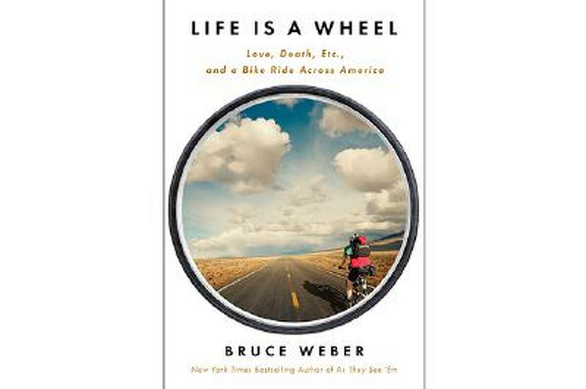 This book cover image released by Scribner shows "Life is a Wheel: Love, Death, Etc., and a Bike Ride Across America," by Bruce Weber. (AP Photo/Scribner)