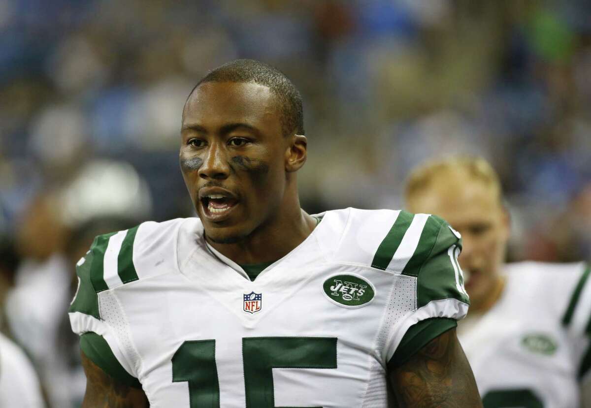 New York Jets receiver Brandon Marshall walks in the bench area during Thursday’s preseason game against the Lions in Detroit.