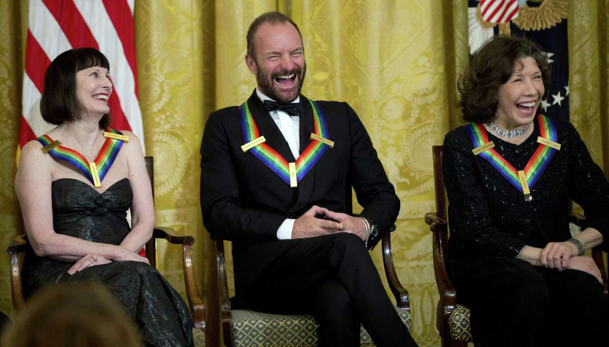 The Kennedy Center Honors Honorees ballerina Patricia McBride, from left, singer-songwriter Sting, and comedienne Lily Tomlin, laugh during a reception in their honor in the East Room of the White House in Washington on Dec. 7, 2014, hosted by President Barack Obama and first lady Michelle Obama.