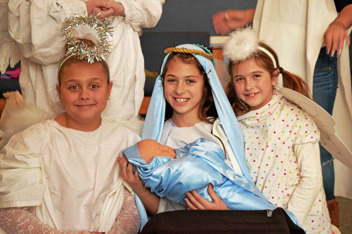 Contributed photoThe Best Christmas Pageant Ever will be presented by the Mad Hatters Theatre Company Dec. 18-19. Above are Lilah Spedding of Old Saybrook as Alice, Gabrielle Walker of Westbrook as Imogene Herdman and Tess Santarsiero of Old Saybrook as an angel.