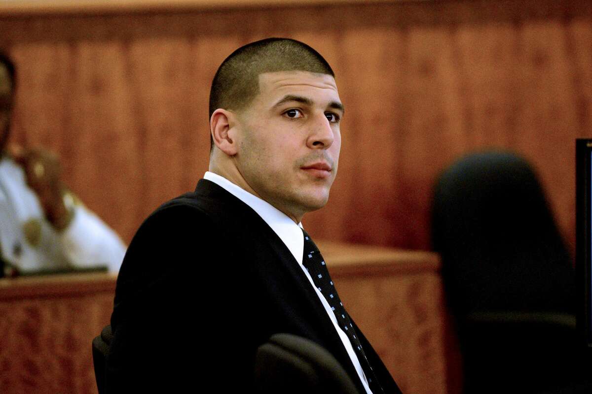 Former New England Patriots football player Aaron Hernandez listens to testimony during his trial in Fall River, Mass., on April 6, 2015. Hernandez is accused of killing Odin Lloyd in June 2013.