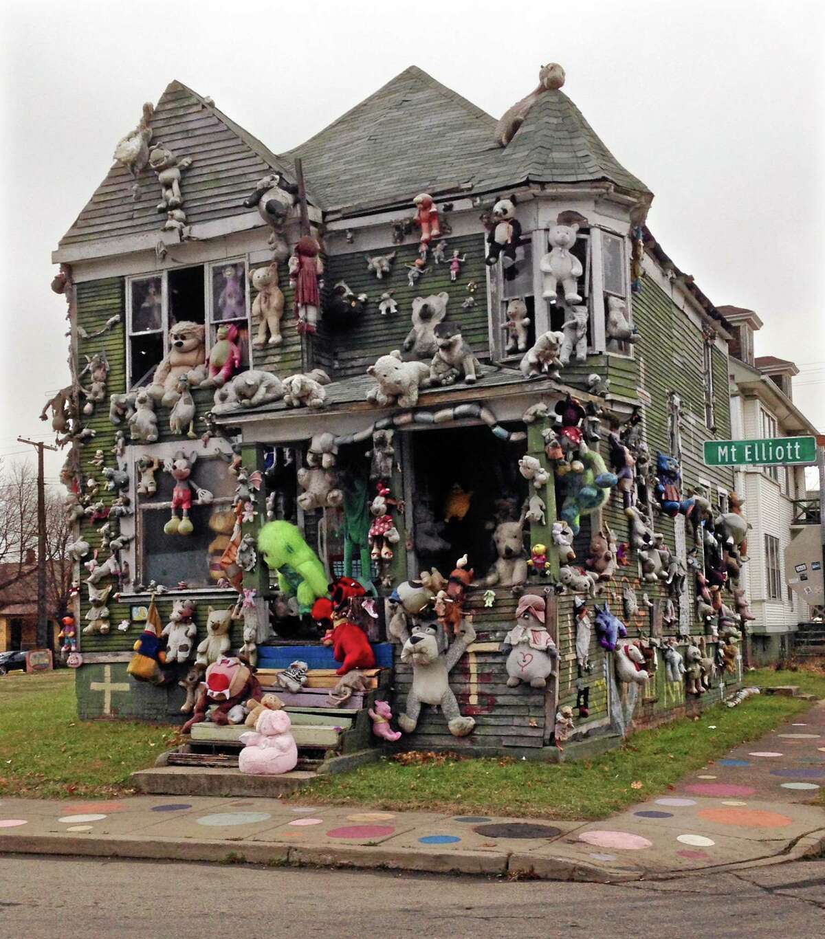 In this Nov. 21, 2013 photo, stuffed animals are seen attached to "The Party Animal House" in the Heidelberg Art Project in Detroit. Another fire has burned a house that's part of the outdoor art installation. WDIV-TV reports that the fire department responded early Friday, March 7, 2014 to the fire on the city's east side that destroyed the building. "The Heidelberg Project has been the target of at least eight earlier suspicious fires. There have been no arrests related to the fires that started in May 2013, but local and federal officials are investigating. Tyree Guyton founded the east-side project in 1986 as a response to urban decay. (AP Photo/Carlos Osorio)