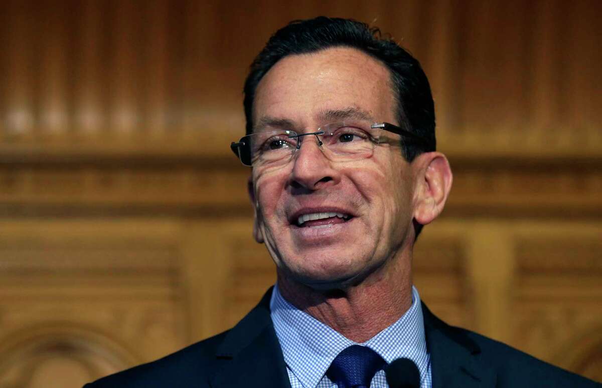 In this Nov. 5, 2014 photo, Connecticut Gov. Dannel Malloy smiles as he thanks supporters at the State House in Hartford.