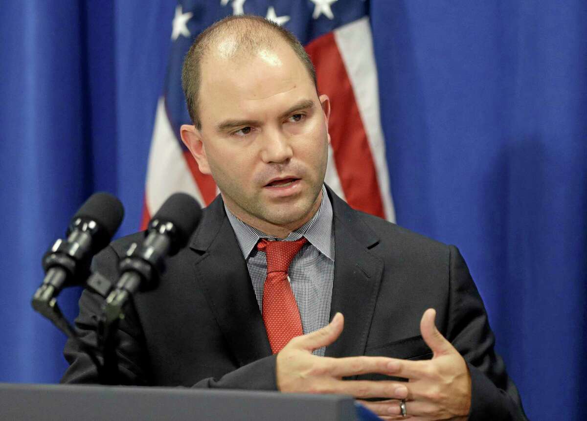 Deputy National Security Adviser for Strategic Communications and Speechwriting, Ben Rhodes, speaks during a news briefing in Edgartown, Mass., on the island of Martha's Vineyard, Wednesday, Aug. 13, 2014. Rhodes discussed the refugee and conflict conditions in Northern Iraq. (AP Photo/Steven Senne)
