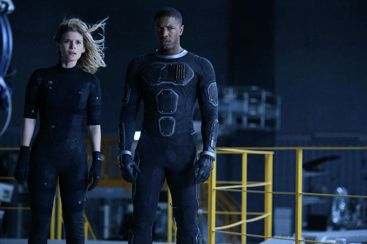 This photo provided by Twentieth Century Fox shows, Kate Mara, left, as Sue Storm, and Michael B. Jordan as Johnny Storm, in a scene from the film, “Fantastic Four.” The movie releases in U.S. theaters on Aug. 7, 2015.