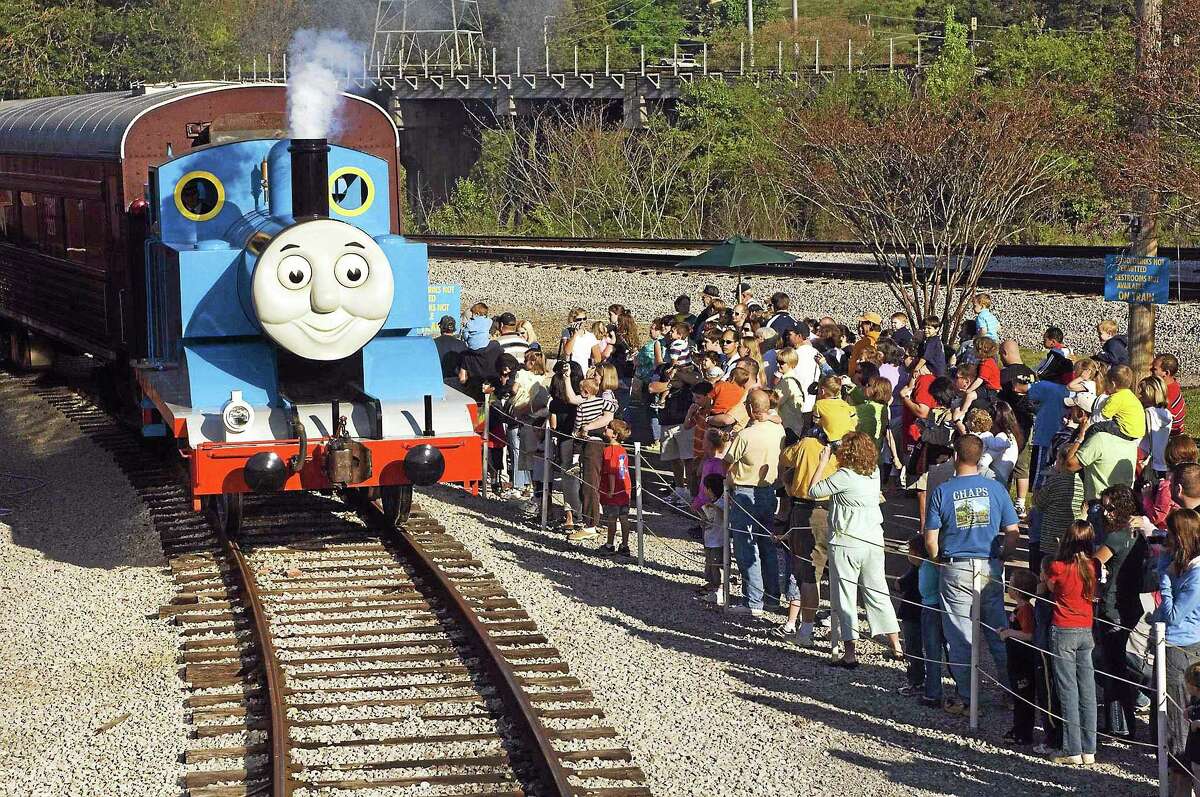 Contributed photos Thomas the Tank Engine pulls into the station in Essex, greeting a crowd of happy, waiting passengers.