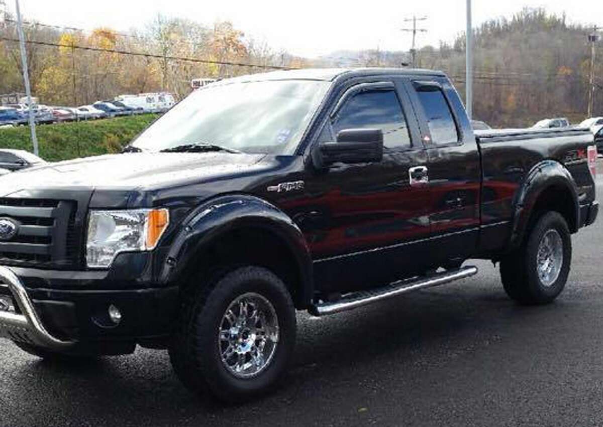 This undated photo provided by the Monongalia County Homeland Security Emergency Mangement Agency shows a black Ford F-150 extended cab that authorities are seeking in connection with a shooting that occurred in Morgantown, W.Va., Monday, Dec. 1, 2014.