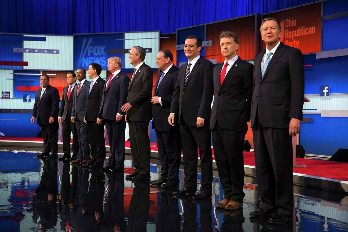 Republican presidential candidates from left, Chris Christie, Marco Rubio, Ben Carson, Scott Walker, Donald Trump, Jeb Bush, Mike Huckabee, Ted Cruz, Rand Paul, and John Kasich take the stage for the first Republican presidential debate at the Quicken Loans Arena Thursday in Cleveland.
