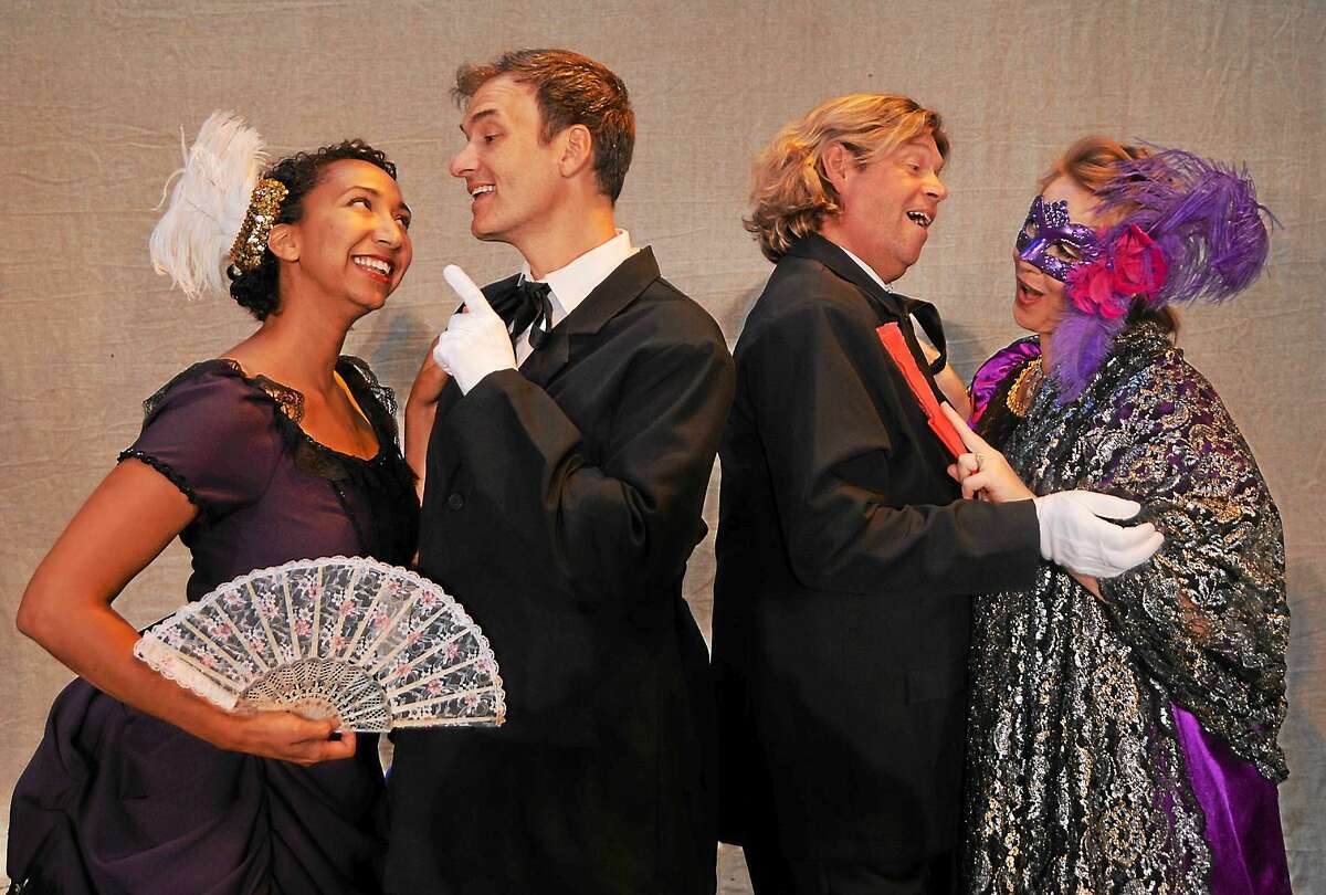 Photos by Alan Casavant Lisa Williamson (Adele), Mark Womack (Falke), Marc Deaton (Eisenstein), and Amanda Hall (Rosalinda) in Opera Theater of Connecticut's upcoming production of "Die Fledermaus" in Clinton.