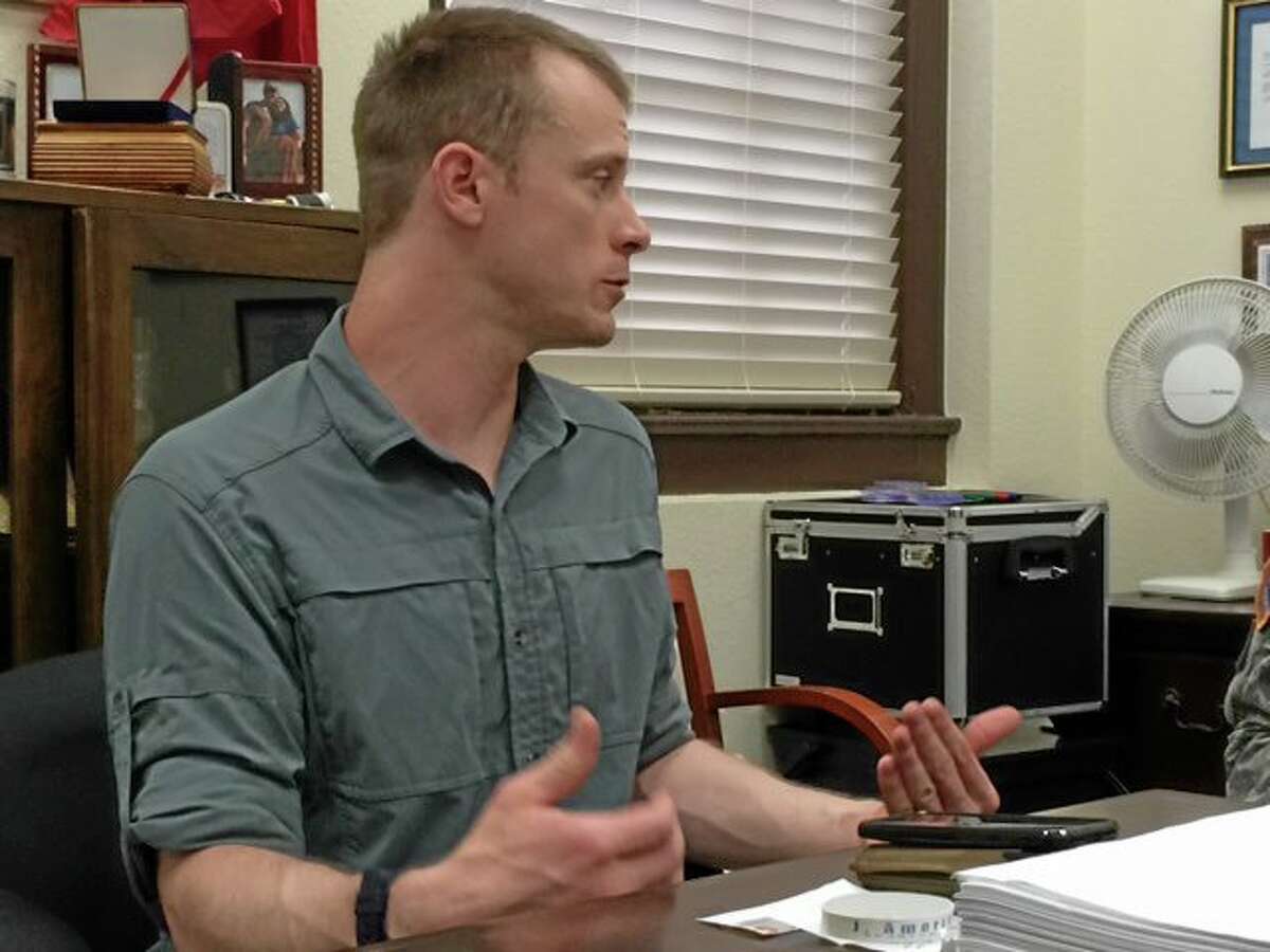 This photo provided by Eugene R. Fidell shows Sgt. Bowe Bergdahl preparing to be interviewed by Army investigators in August, 2014. The U.S. Army has begun questioning Bergdahl about his disappearance in Afghanistan that led to five years in captivity by the Taliban, his attorney and an Army spokeswoman said Wednesday, Aug. 6, 2014. (AP Photo/Eugene R. Fidell) MANDATORY CREDIT