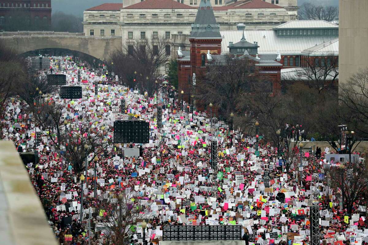 FILE - In this Jan. 21, 2017 file photo, a crowd fills Independence Avenue during the Women's March on Washington, in Washington. The resistance movement that flourished with Donald Trump?’s ascendance to the White House isn?’t necessarily itching to see his presidency undone by the investigation into Russia?’s election meddling or even impeachment. (AP Photo/Alex Brandon, File) ORG XMIT: WX105