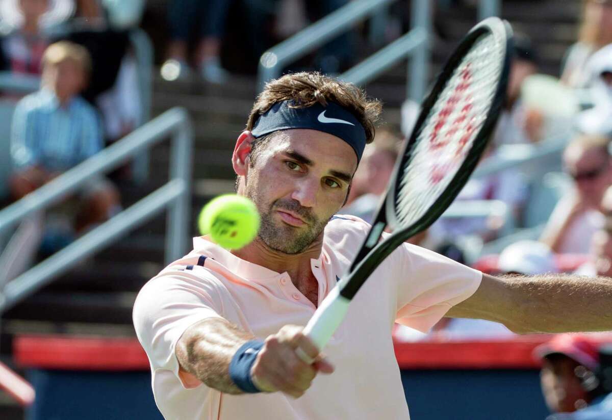 No. 2 seed Roger Federer﻿ returns the ball in Saturday's 6-3, 7-6 (5) victory over unseeded Robin Haase to advance to the Rogers Cup final in Montreal.﻿