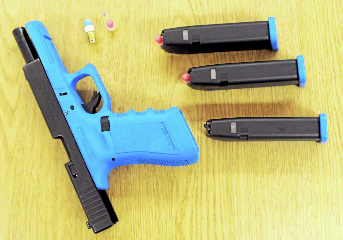 A Glock pistol with “simunitions” ammunition that the Bristol Police Department uses with the Canadian Academy of Practical Shooting system.