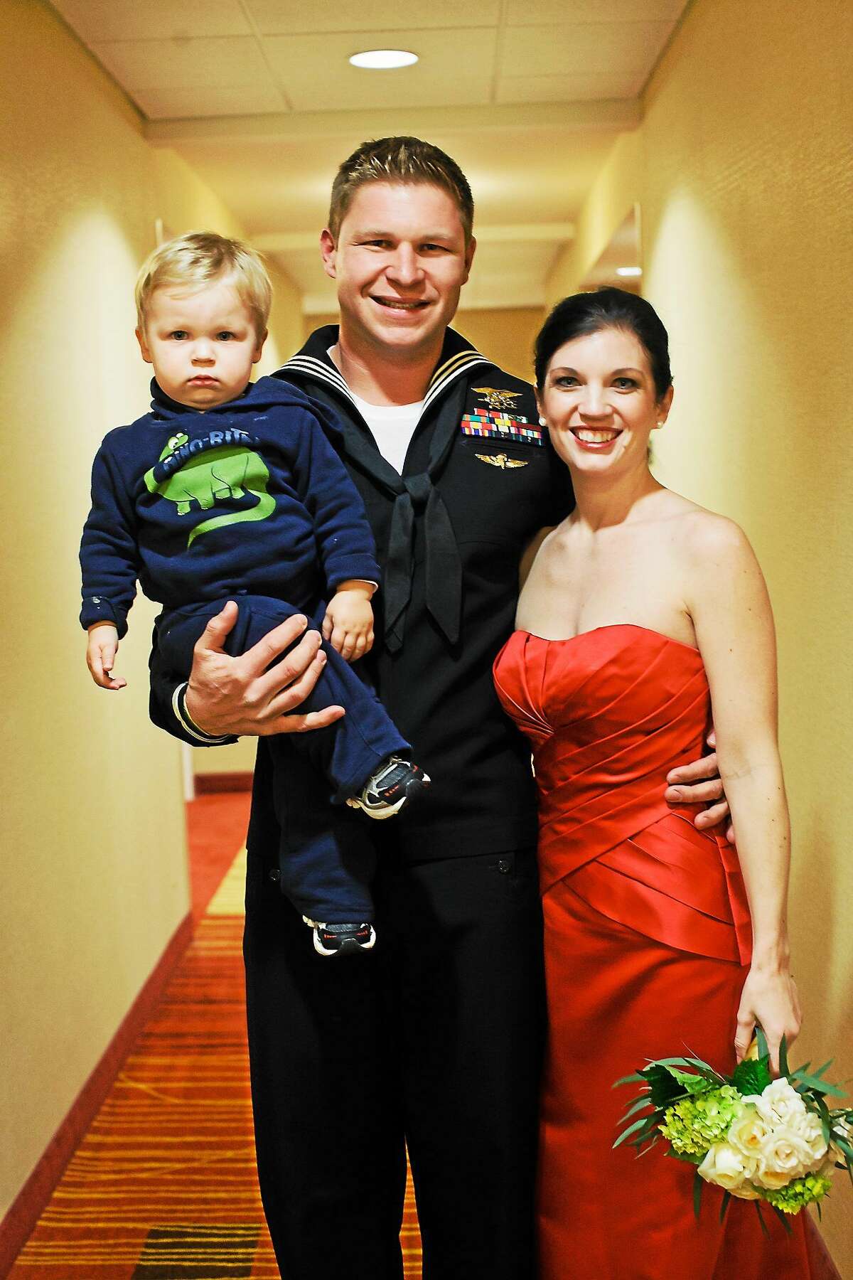 Kevin and Lindsey Lacz of Middlefield with their son