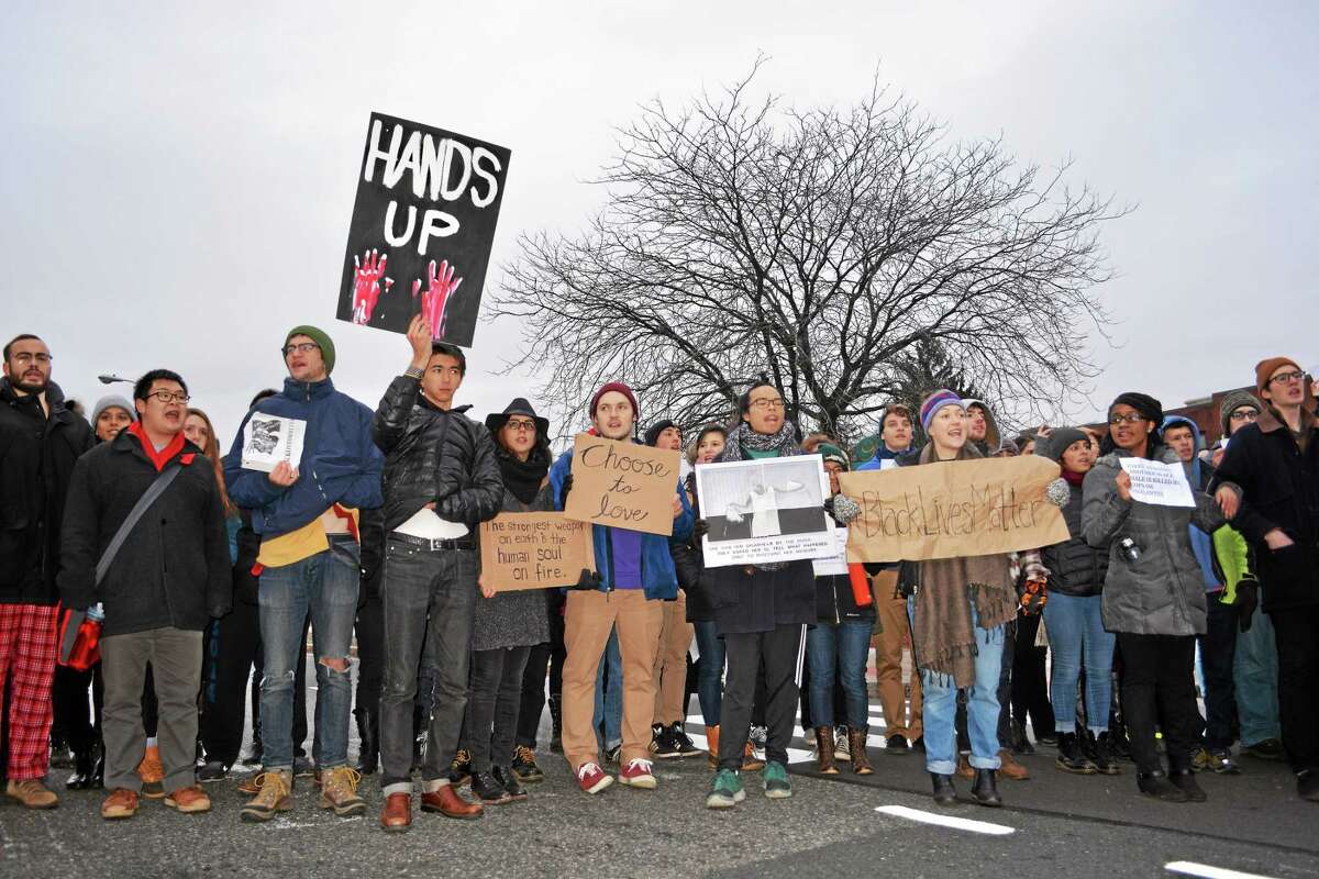 Hundreds of students, faculty and Middletown residents marched for justice and in solidarity with Ferguson and Staten Island’s protests agains the Michael Brown and Eric Garner grand jury decisions — from campus to the busy Main and Washington street intersection.