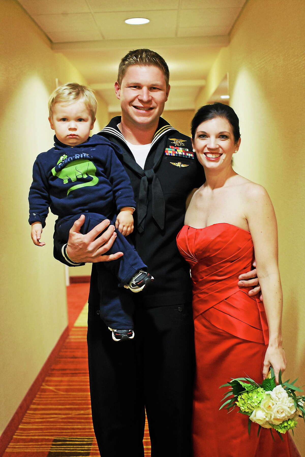Kevin and Lindsey Lacz of Middlefield with their son.