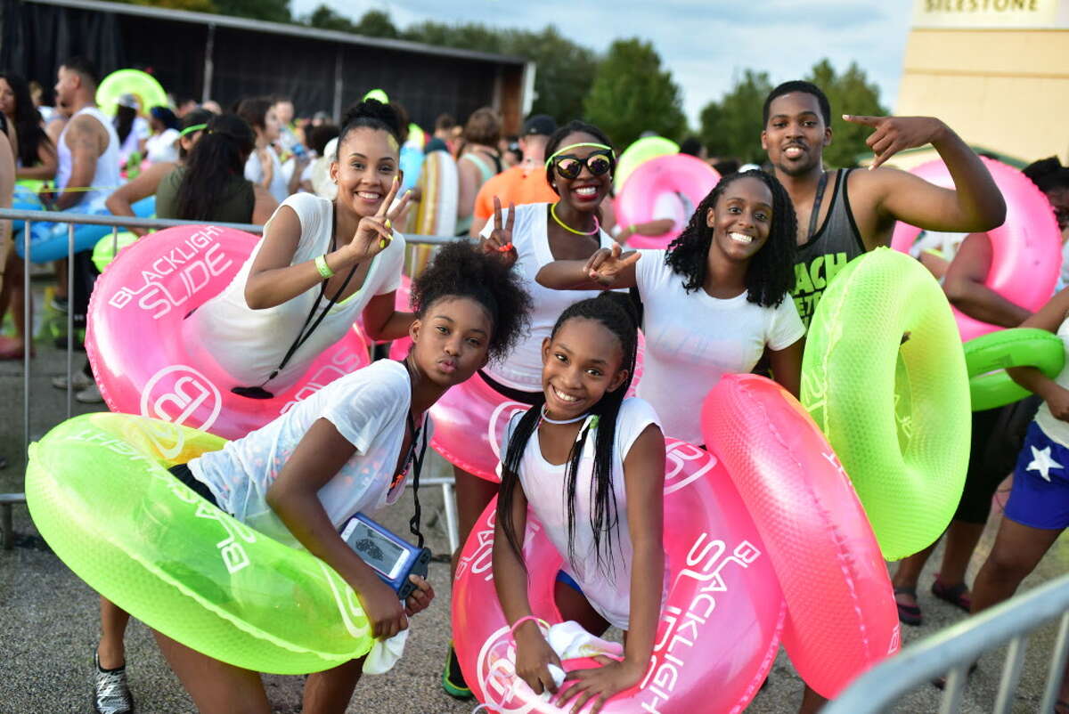 Houstonians party it up at Sam Houston Raceway for the Blacklight Slide