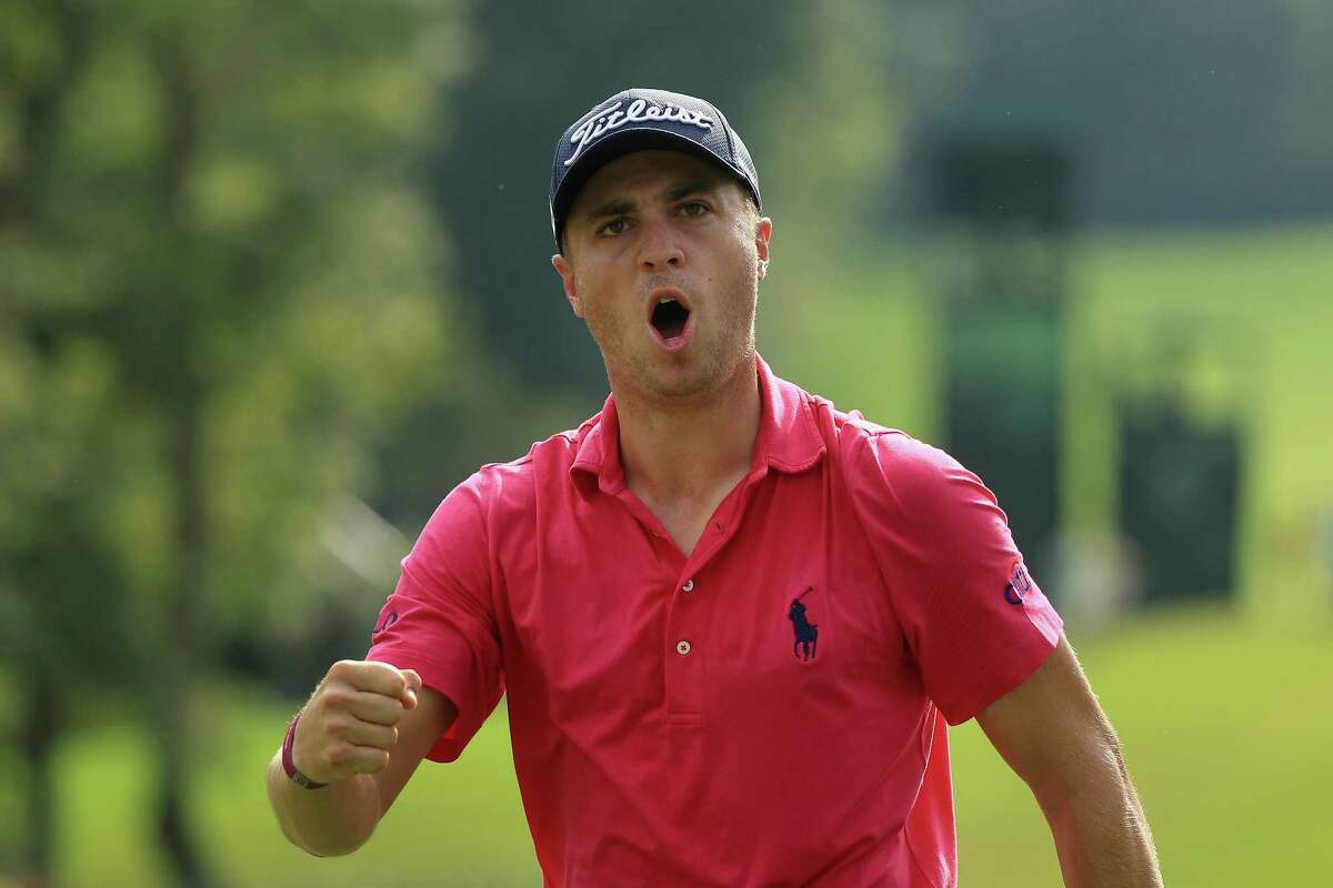 CHARLOTTE, NC - AUGUST 13: Justin Thomas of the United States reacts to his birdie putt on the 13th green during the final round of the 2017 PGA Championship at Quail Hollow Club on August 13, 2017 in Charlotte, North Carolina. (Photo by Mike Ehrmann/Getty Images)