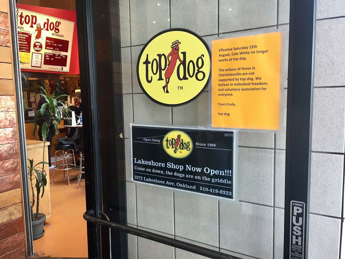 East Bay hot dog chain Top Dog posted notice Sunday that it had fired an employee after he was reported to have participated in a white nationalist rally in Charlottesville, Va.