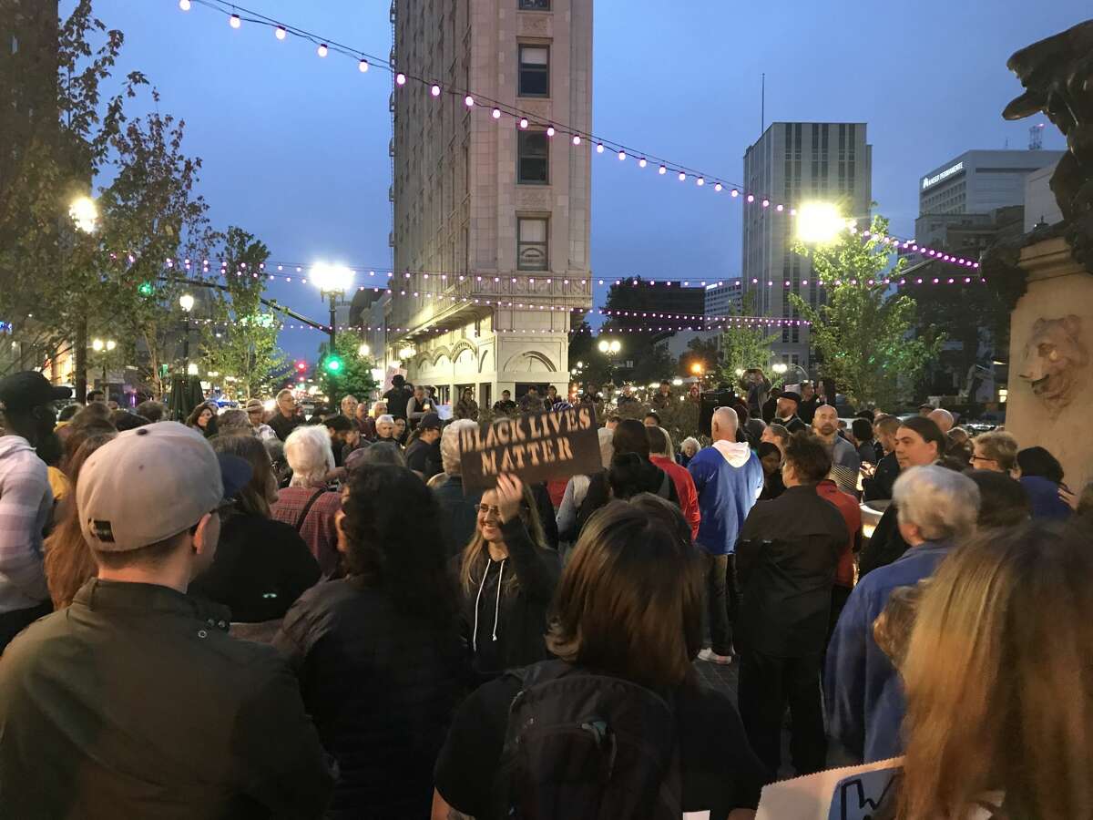 Scenes from a vigil against racial hatred in Oakland on Sunday, August 13, 2017.