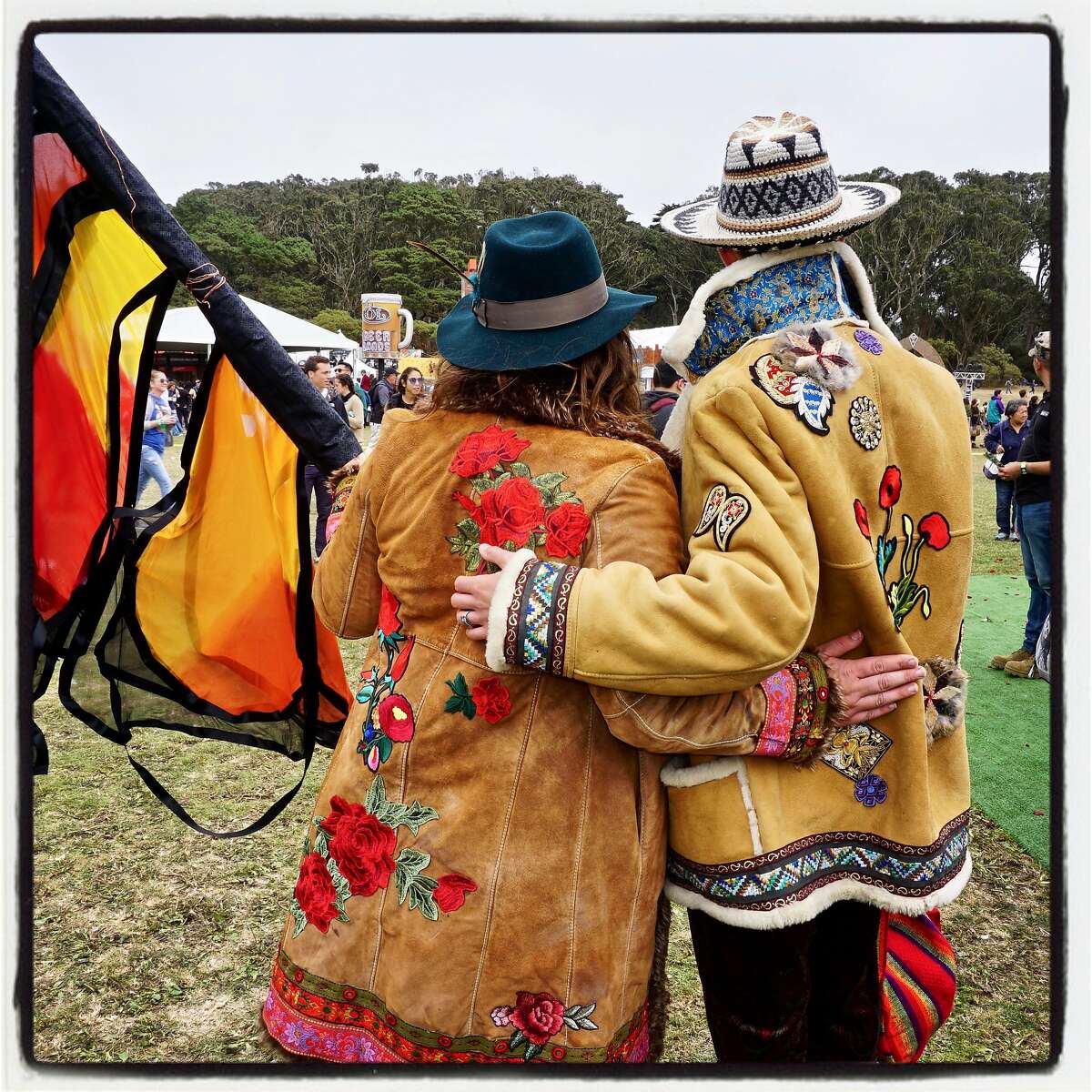 Chelsea Argabrite (left) and Jonathan Bloch wear flea market jackets they hand-embellished at Outside Lands. Aug. 13, 2017.