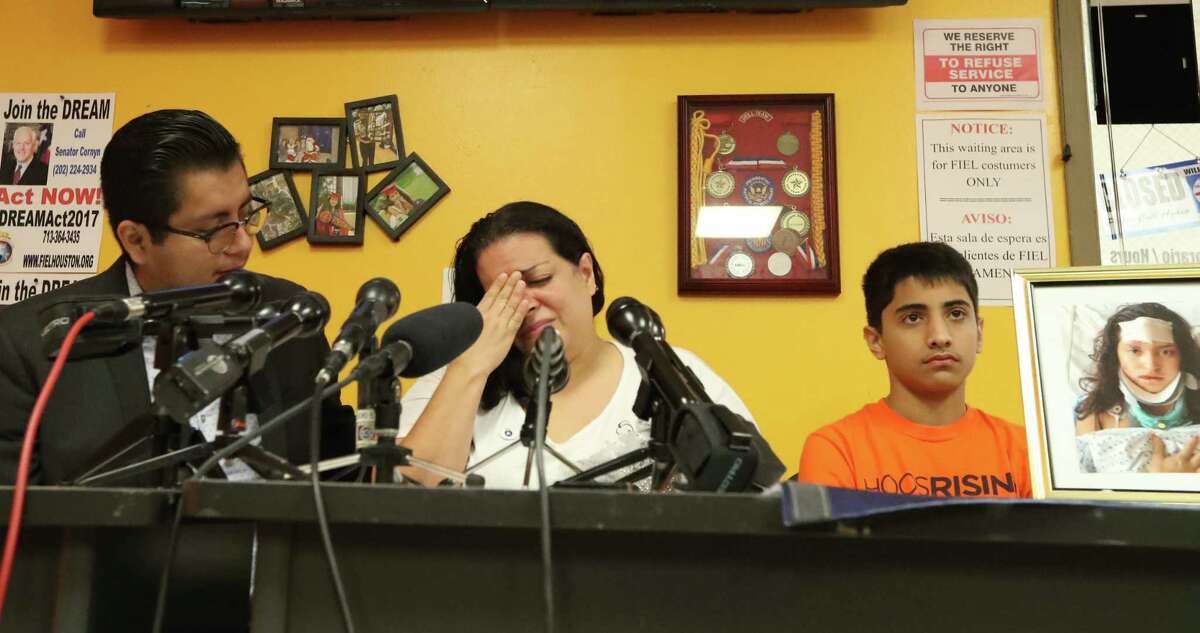 Ericka Chaves (center) is flanked by Cesar Espinosa (left) and her son Sebastian as she talked about her daughter Natalie Romero Monday, Aug. 14, 2017, in Houston. Romero was amongst those injured in Charlottesville Virginia on August 12, 2017. She has suffered extensive injuries including a fractured skull. It is the mother's wish that her daughter may return home so she can look after her daughter.