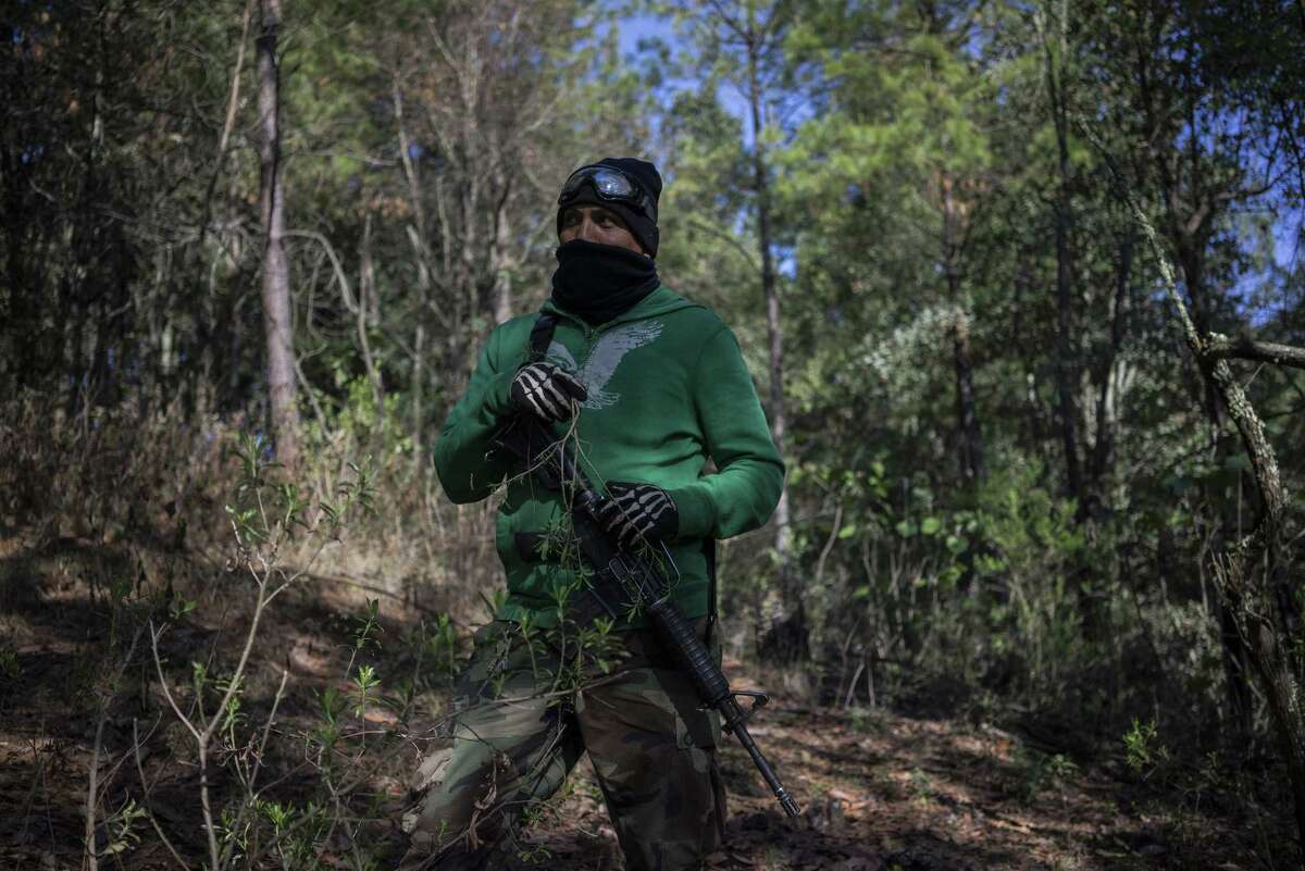 A member of the Forest Keepers patrols in search of illegal loggers in Cheran, Michoacan State, Mexico, on June 9, 2017. "Since the very beginning we have wanted three things: security, justice, and the restoration of our land," Pedro Chavez Sanches says. "Security was made possible thanks to our community patrol. The reconstitution of our land has been made possible because of the tree nursery. Justice, however, that is not that easy. The people of Cherán have lost loved ones, have family members that remain missing, they have pain, so justice is the hardest to reach, but we are progressing."