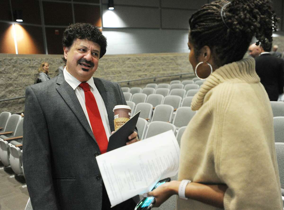 Bridgeport Education Association President Gary Peluchette talks with Bridgeport Superintendent of Schools Aresta Johnson during the Commissioner's Annual Back-to-School Meeting with Superintendents at Maloney High School in Meriden, Conn. on Tuesday, August 15, 2017. A "show of concern" press conference following the event urged legislators and the governor to agree on a state budget to avoid harms to public education.