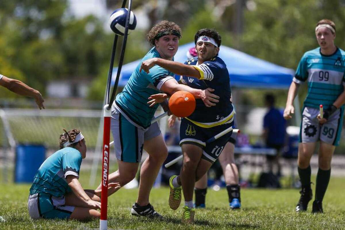Washington Admirals chaser Raul Natera scores on Detroit Innovators beater Jack Slater during the Major League Quidditch national tournament in League City.