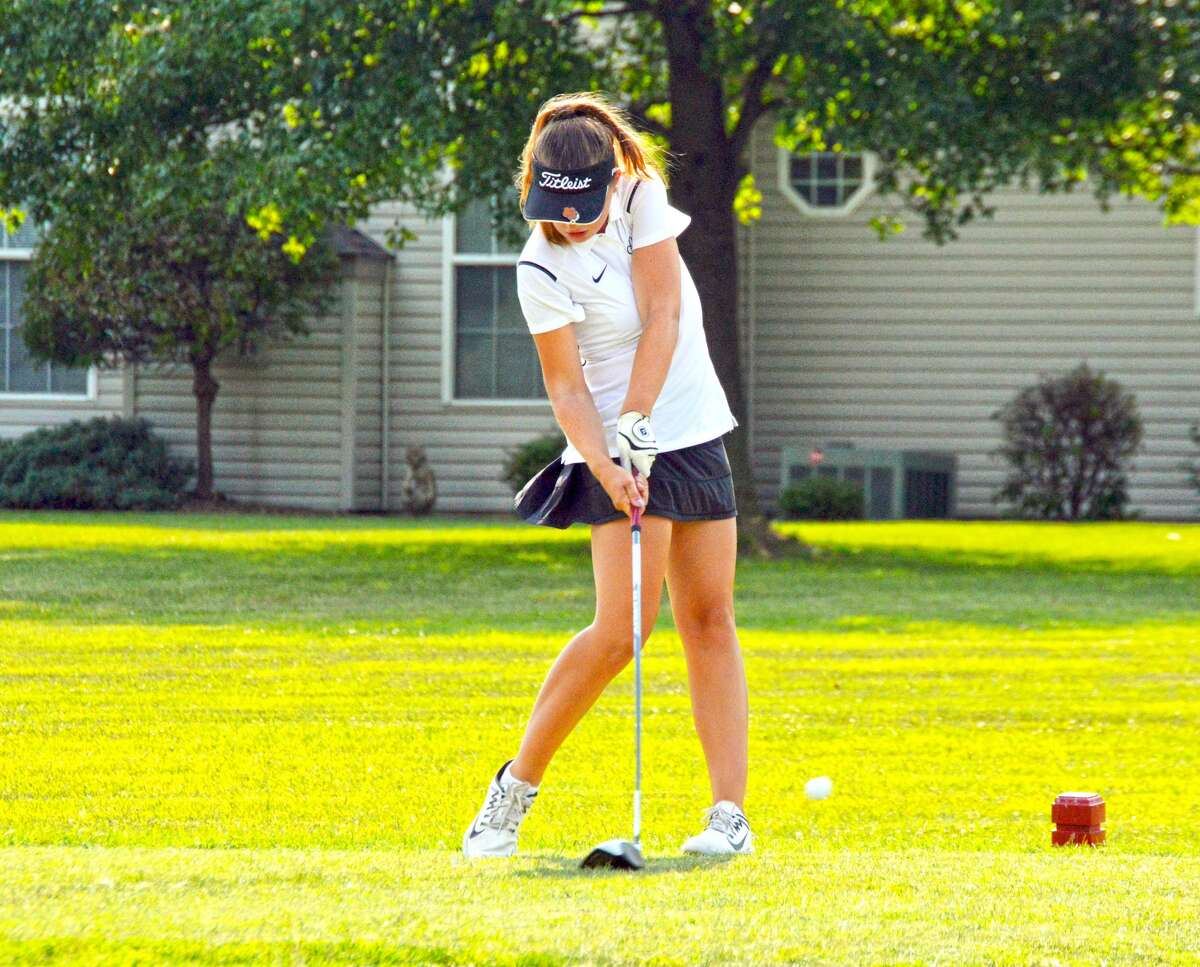 Edwardsville sophomore Jessica Benson hits her tee shot off the fourth hole of Tuesday’s Madison County Tournament at the Legacy Golf Course in Granite City.