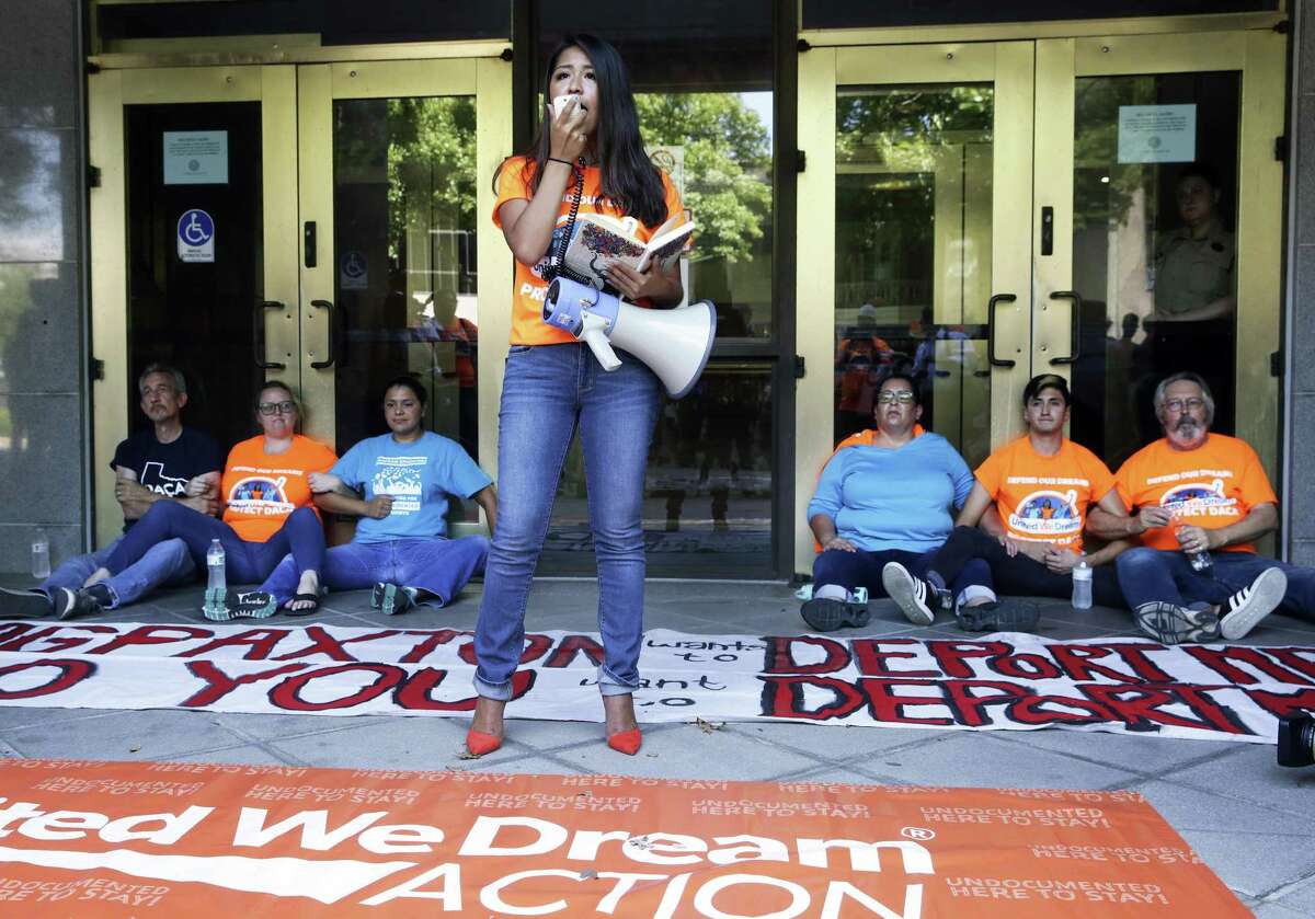 Vanessa Rodriguez speaks as millenials demonstrate their support for DACA programs in front of the Price Daniel, Sr. building in Austin which contains the offices of Attorney General Ken Paxton on August 15, 2017.