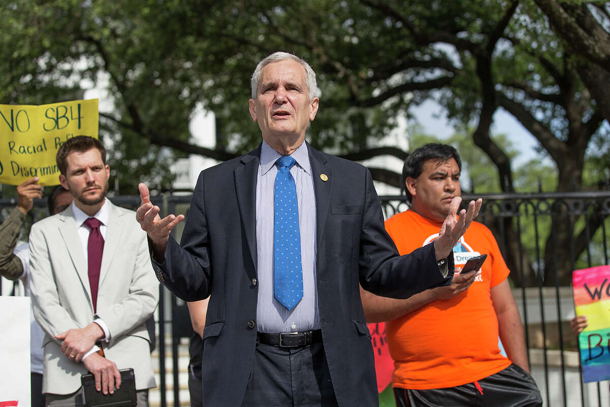 U.S Rep. Lloyd Doggett speaks during a protest outside of the Texas Governor's Mansion in Austin, Texas, Monday, May 8, 2017. The gathering was to protest Texas' new "sanctuary cities" law, which takes effect in September and which critics say is the most anti-immigrant since a 2010 Arizona law, that will allow police officers to ask about the immigration status of anyone they detain, including during routine traffic stops. Republican Gov. Greg Abbott signed the law Sunday evening on Facebook Live with no advanced warning. (Ricardo B. Brazziell/Austin American-Statesman via AP)