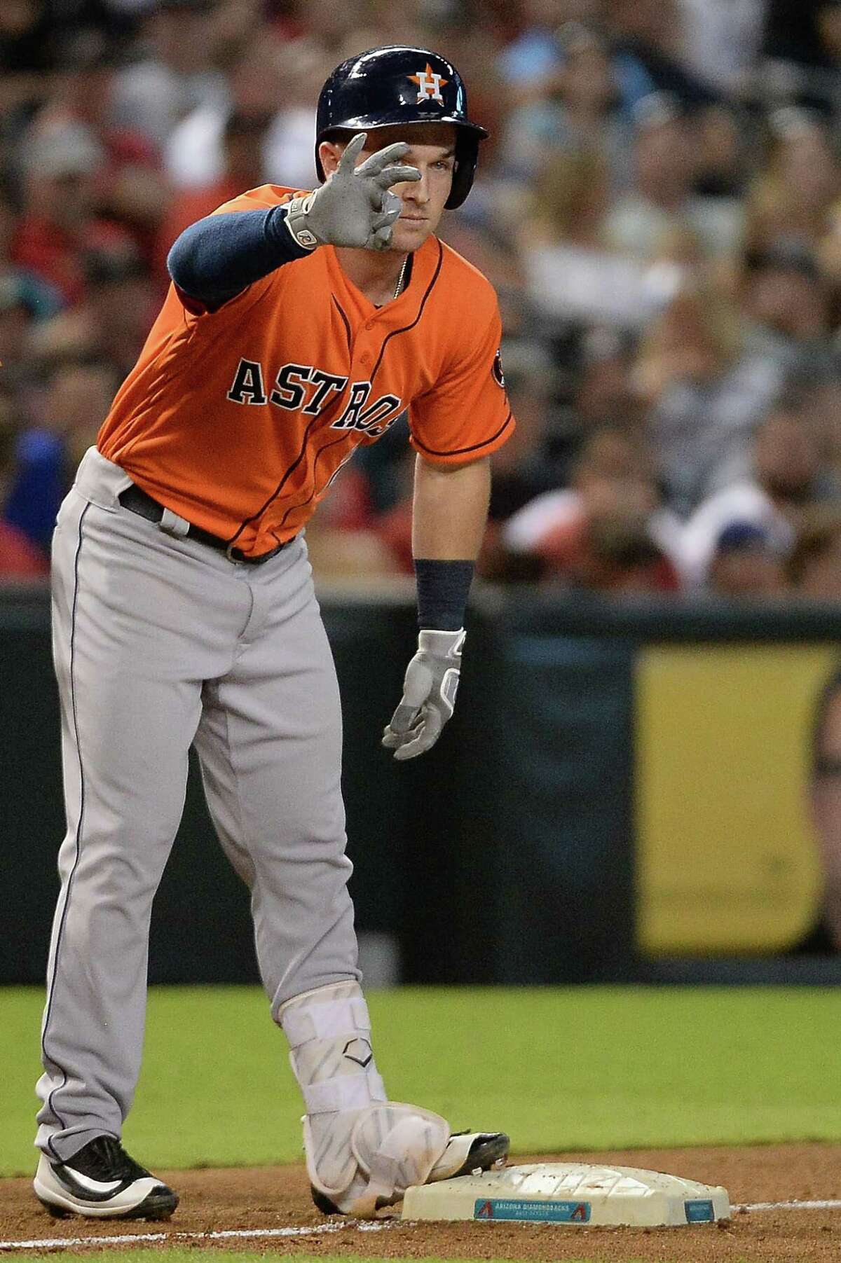 Alex Bregman reaches third for one of the Astros' four extra-base hits in a five-run second inning.