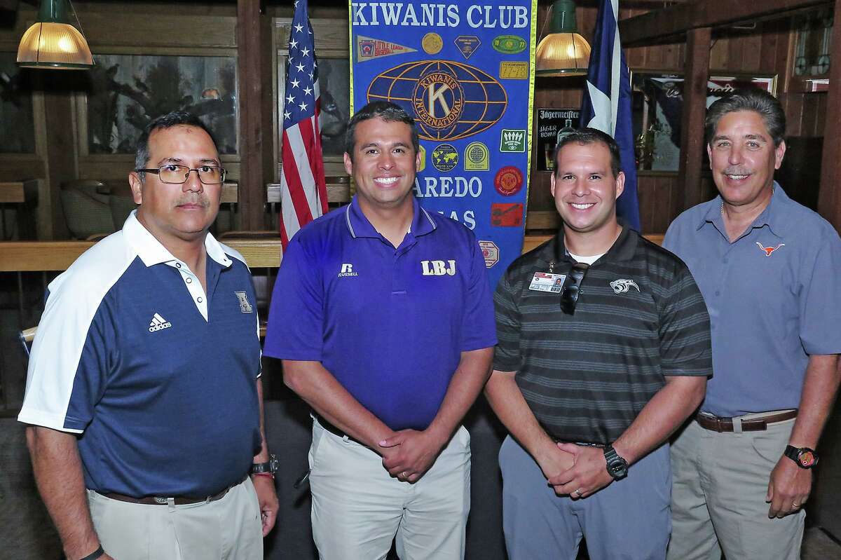 Coach Joel Lopez, far left, has been the Alexander High football head coach for more than 10 years. He did not respond to requests for comment Saturday. 
