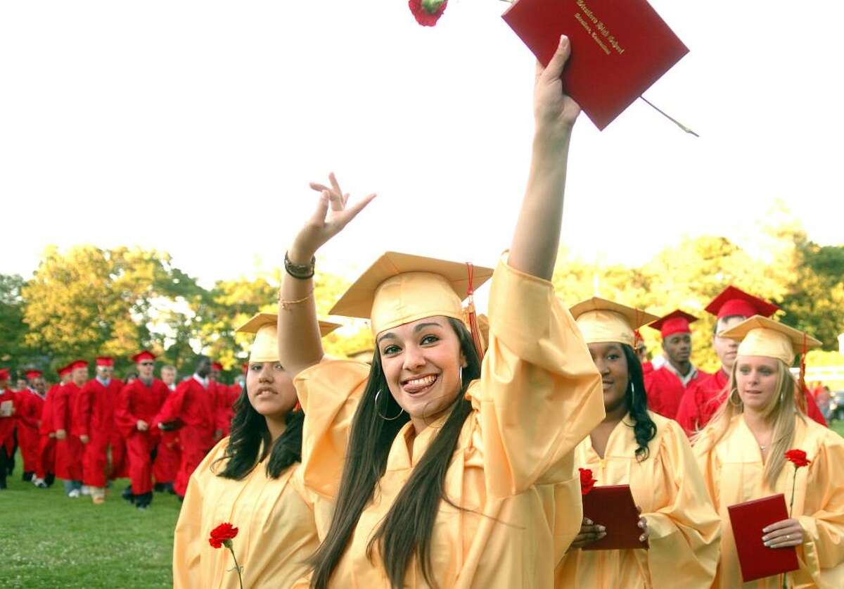 Graduate Barbara Fontes cheers as she marches off of Penders Field with the class of 2010 following the Stratford High School Commencement Ceremony Thursday June 17.