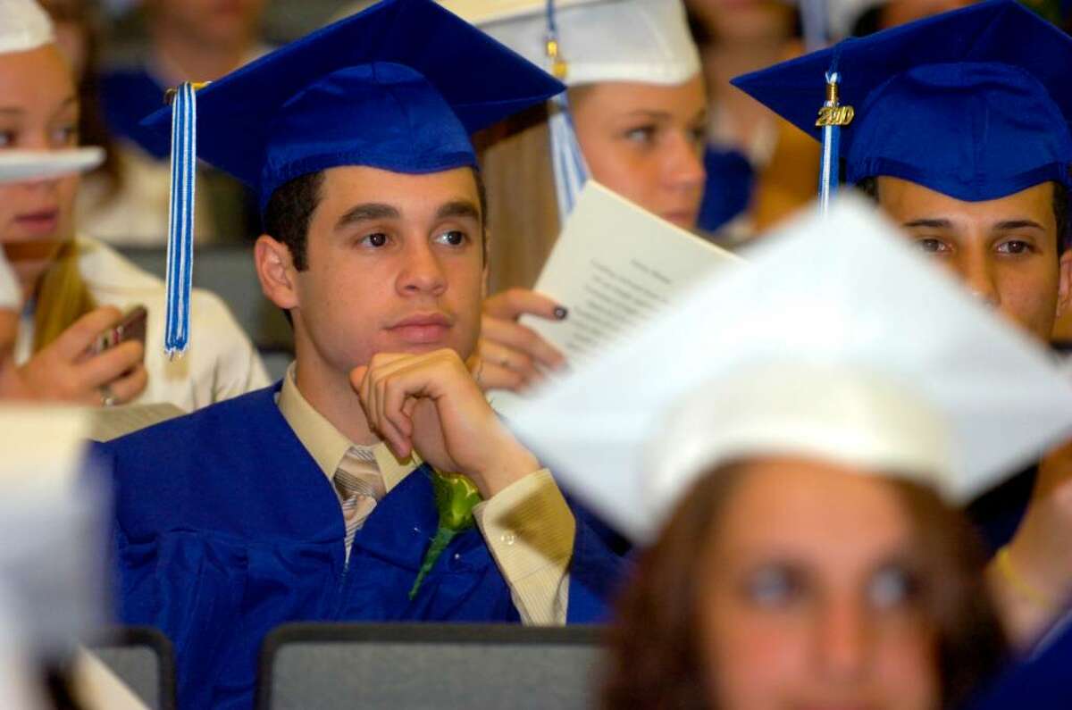 Miguel Hernandez waits in Bunnell High School for the beginning of the procession during the graduation ceremony on the football field Thursday, June 17, 2010.