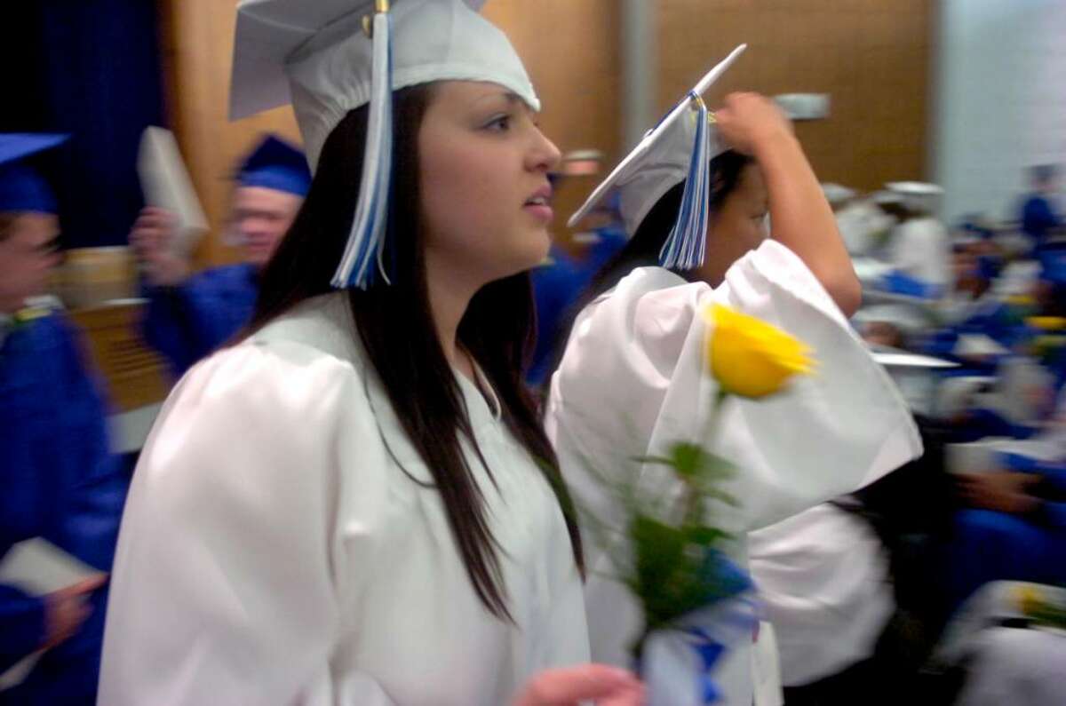 Stephanie DeGennaro waits in Bunnell High School for the beginning of the procession during the graduation ceremony on the football field Thursday, June 17, 2010.