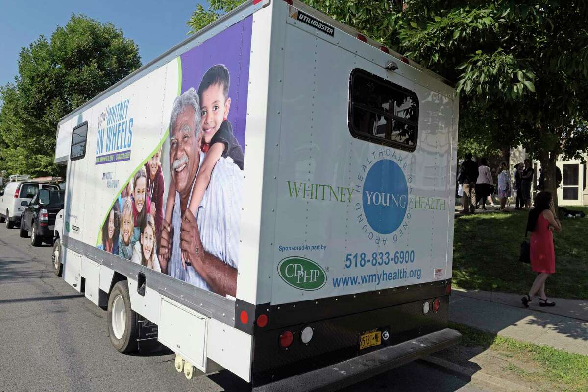 A view of the Whitney Young Health's mobile health unit at North Albany Academy on Wednesday, Aug. 16, 2017, in Albany, N.Y. A press event was held Wednesday to announce that Whitney Young Health's mobile health unit services will be offered to the students, teachers and families at the school. (Paul Buckowski / Times Union)
