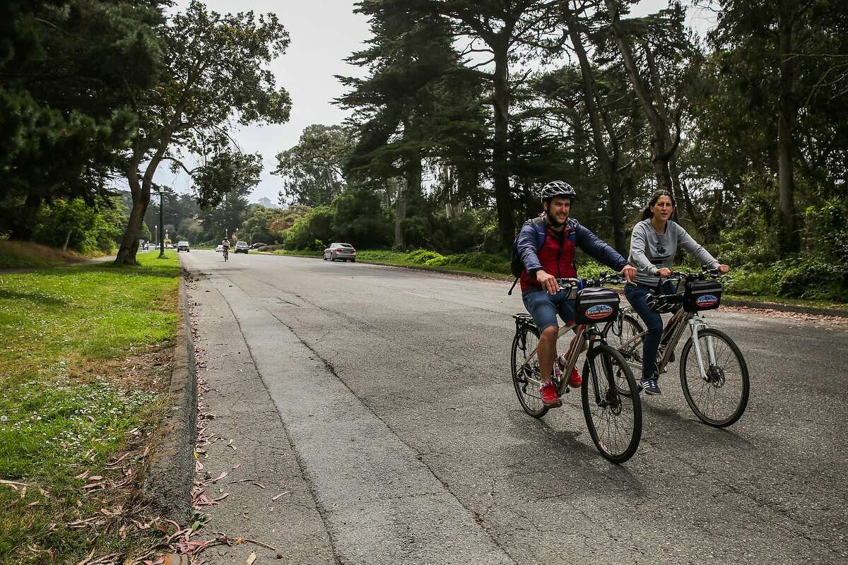 People bike on Martin Luther King Jr. Drive between Lincoln Blvd and Bernice Rodgers Way in San Francisco, Calif., on Wednesday, Aug. 16, 2017.