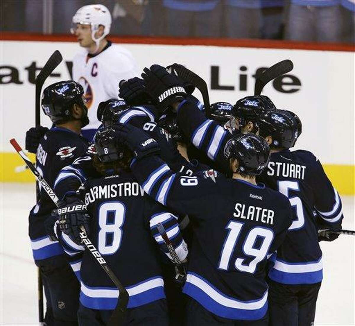 ISLANDERS: Winnipeg Jets rally, top New York in overtime