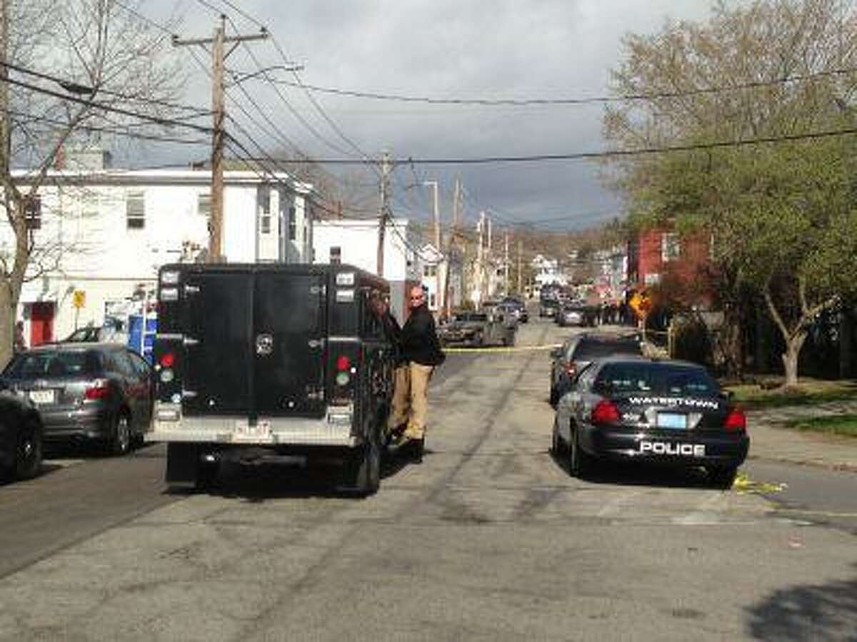 The police presence Friday morning in Watertown, Mass., was highly visible as authorities sought a second suspect in the Boston Marathon bombings after the first was killed in a confrontation early Friday morning.