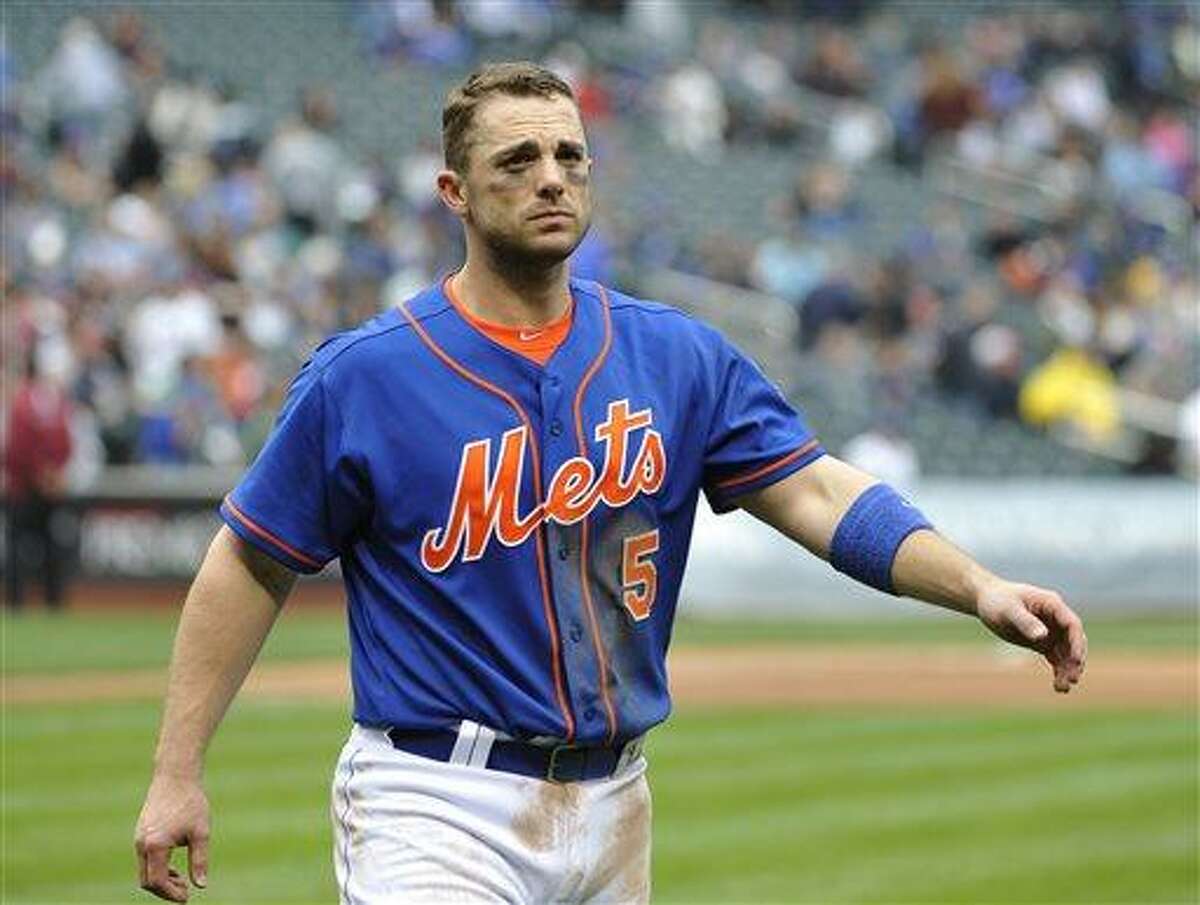 New York Mets' David Wright (5) walks back to the dugout after striking out in the seventh inning of a baseball game against the Pittsburgh Pirates at Citi Field on Saturday, May 11, 2013, in New York. (AP Photo/Kathy Kmonicek)