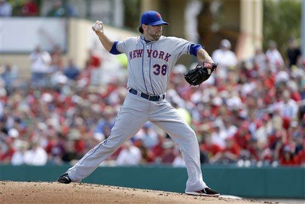 New York Mets starting pitcher Shaun Marcum throws during an exhibition spring training baseball game against the St. Louis Cardinals Sunday, March 10, 2013, in Jupiter, Fla. (AP Photo/Jeff Roberson)