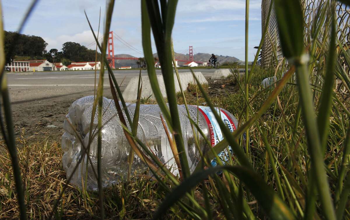 A discarded plastic bottle at Crissy Field on Tuesday Mar. 26, 2013, in San Francisco, Ca. Members of the San Francisco Board of Supervisors along with the group Corporate Accountability International are behind a campaign to get the Golden Gate National Recreation Area and Yosemite National Park to stop selling bottled water and switch to water refill stations and drinking fountains.