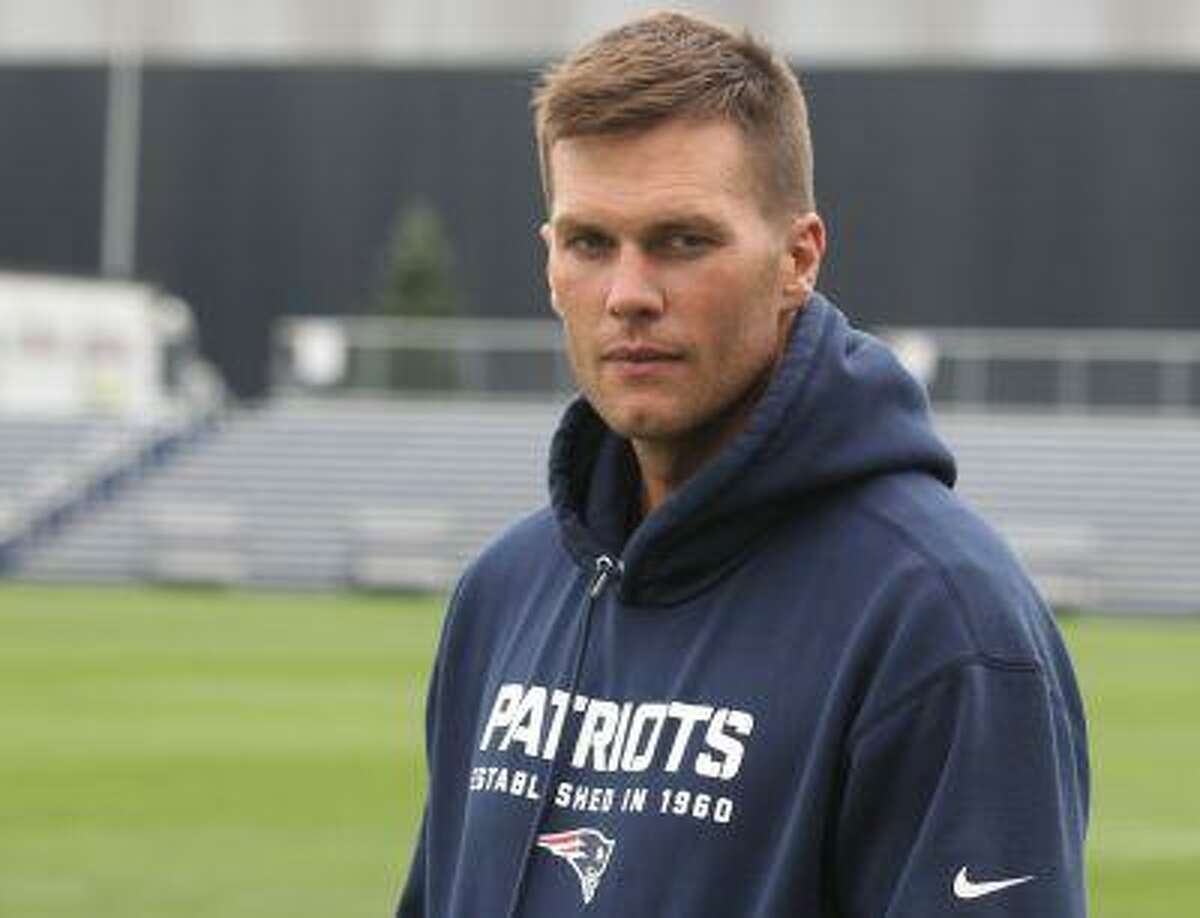 New England Patriots quarterback Tom Brady speaks to the media