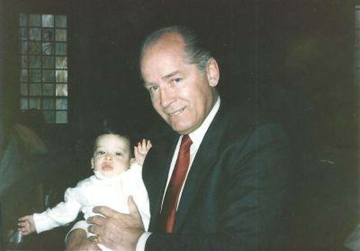 James "Whitey" Bulger holds John Martorano's youngest son, John Jr., during his Christening ceremony in this undated handout photo provided by the U.S. Attorney's Office in Massachusetts.